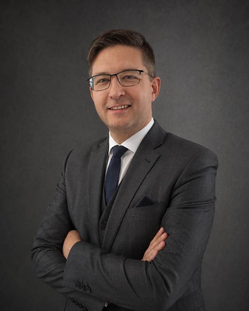 Michael Molek, investiční analytik
